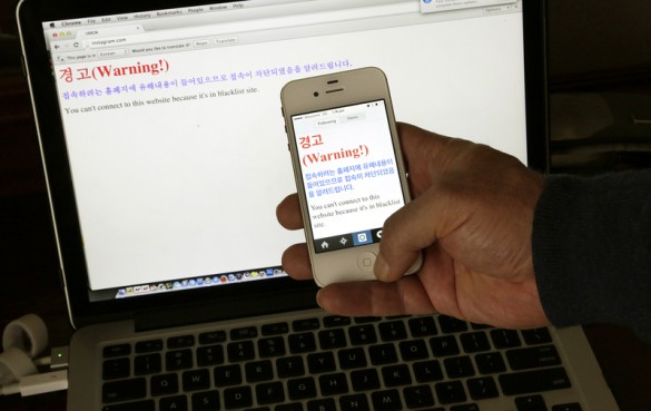 In this Saturday, June 20, 2015 photo, a notification which reads, Warning! You cant connect to this website because its in blacklist site" is seen on both a computer screen and on a smartphone screen in Pyongyang, North Korea. Warnings are appearing on Instagram accounts in North Korea that claim access to the popular photo-sharing app is being denied and the site is blacklisted for harmful content. <a href=